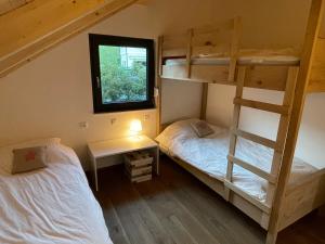 Postel nebo postele na pokoji v ubytování Luxury Chalet Mauthner Alm + 29 fotografií