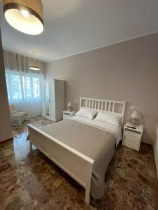 Un ou plusieurs lits dans un hébergement de l'établissement Alloggio Turistico Dea Bendata