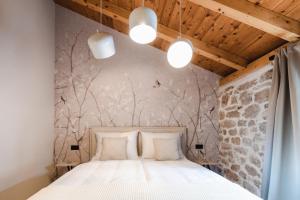 Кровать или кровати в номере Amoretta rooms