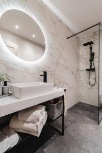 Ванная комната в Amoretta rooms