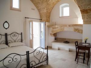 Postel nebo postele na pokoji v ubytování Asylum Amicorum Bed & Breakfast