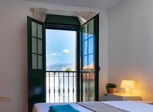 Posteľ alebo postele v izbe v ubytovaní Andaluz Apartments Torrecilla
