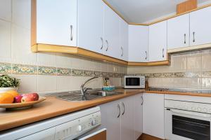 Kuchyňa alebo kuchynka v ubytovaní Andaluz Apartments Torrecilla