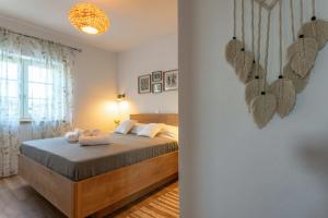 Posteľ alebo postele v izbe v ubytovaní HANA Luxury apartment with sea view