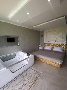 Postel nebo postele na pokoji v ubytování Lux Vila Aleksandar