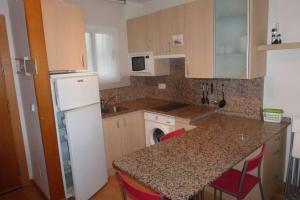 Kuchyň nebo kuchyňský kout v ubytování APARTAMENTO A 1ª LINEA DE MAR, VILAFORTUNY