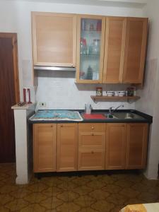 Kuchyňa alebo kuchynka v ubytovaní Nunzia's House