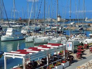 a marina filled with lots of boats in the water at Annadia Sweet Home B&B in Lido di Ostia