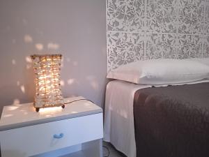 Letto o letti in una camera di Guest House Oleandro