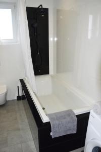 Kúpeľňa v ubytovaní Domek pod świerkami - "Apartamenty świerkowe"