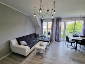 Posedenie v ubytovaní Domek pod świerkami - "Apartamenty świerkowe"