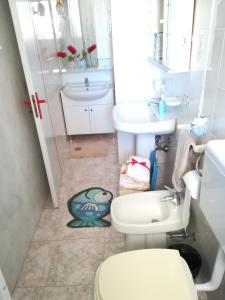 Koupelna v ubytování Casa Rosa + 21 fotografií
