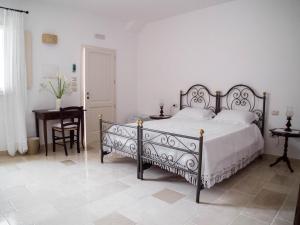 Postel nebo postele na pokoji v ubytování Asylum Amicorum Bed & Breakfast