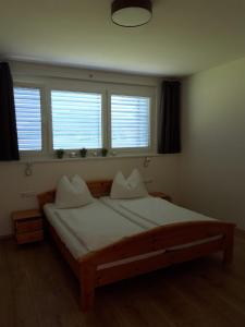 Postel nebo postele na pokoji v ubytování Nico's Place