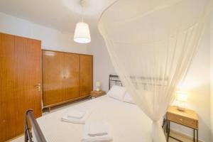 Posteľ alebo postele v izbe v ubytovaní Fortezza Garden Home