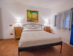 Postel nebo postele na pokoji v ubytování Agriturismo Casa Turchetti