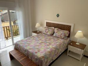 Cama o camas de una habitación en Casa em condomínio fechado, com piscina privativa em Juquehy