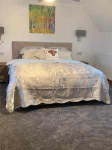 Postel nebo postele na pokoji v ubytování Ben Nevis Manor