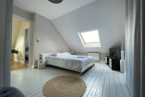 Ένα ή περισσότερα κρεβάτια σε δωμάτιο στο Superb duplex near the Halles de Tours