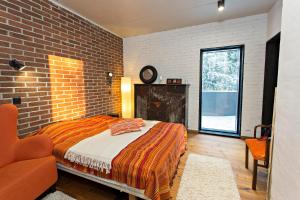 Postel nebo postele na pokoji v ubytování Oulu Loft Guesthouse