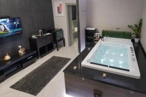 A television and/or entertainment centre at Suite Catania Lungomare