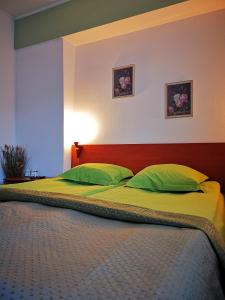 Postel nebo postele na pokoji v ubytování Zigen House