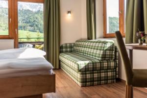 Postel nebo postele na pokoji v ubytování Hotel Starchlhof