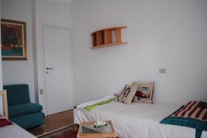 Postel nebo postele na pokoji v ubytování Elly Casa Vacanze