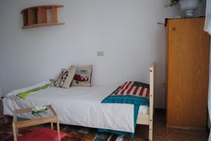 Postel nebo postele na pokoji v ubytování Elly Casa Vacanze