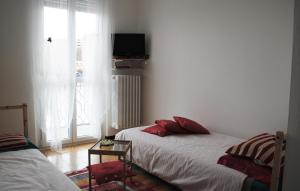 Postel nebo postele na pokoji v ubytování Elly Casa Vacanze