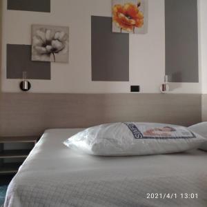 Postel nebo postele na pokoji v ubytování B&B Adriatico