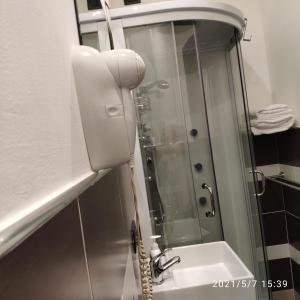 a bathroom with a shower and a sink at B&B Adriatico in Giulianova