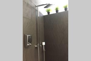 Koupelna v ubytování IMAGEN SUITE + 20 fotografií