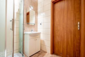 Łazienka w obiekcie Apartamenty Plazowa