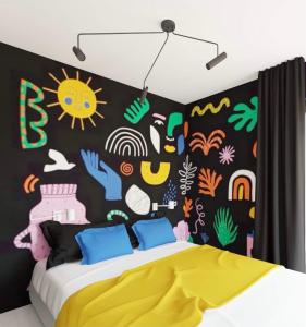 Ένα ή περισσότερα κρεβάτια σε δωμάτιο στο Art Apartments