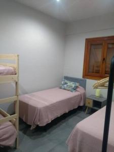 Postel nebo postele na pokoji v ubytování Casa-Grima