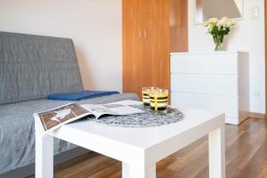Łóżko lub łóżka w pokoju w obiekcie Apartamenty Plazowa
