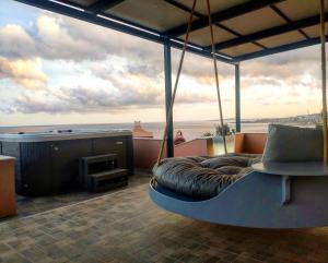 Posezení v ubytování Ardani paradise view villa with jacuzzi