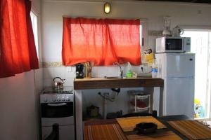 Kuchyň nebo kuchyňský kout v ubytování LAS CASITAS III