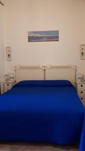 Postel nebo postele na pokoji v ubytování Villa Orchidea -San Lorenzo - Marzamemi