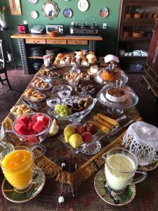 Opções de café da manhã disponíveis para hóspedes em Relais Amadeus Pousada de Charme