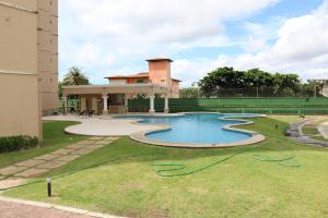 The swimming pool at or close to BEACH VILLAGE PRAIA DO FUTURO 904NORTE