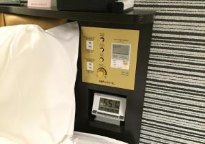 Krevet ili kreveti u jedinici u objektu APA Hotel Nagoya Ekimae