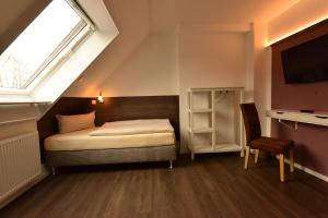 Postel nebo postele na pokoji v ubytování Hotel Weinert