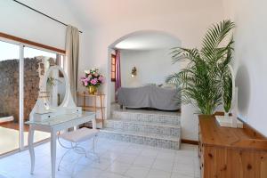 a bathroom with a dressing table and a mirror at Villa Alex in Puerto del Carmen +22 photos