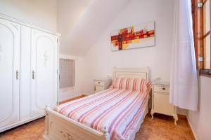 Łóżko lub łóżka w pokoju w obiekcie Ses Comes de Son Cladera