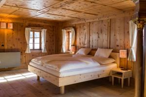 Postel nebo postele na pokoji v ubytování Appartements zi Ranna