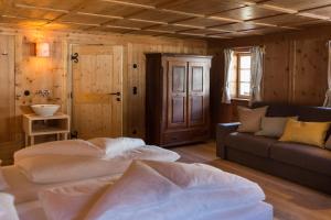 Postel nebo postele na pokoji v ubytování Appartements zi Ranna