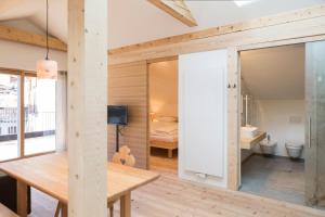 Postel nebo postele na pokoji v ubytování Appartements zi Ranna