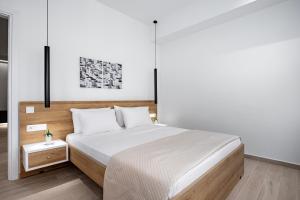Posteľ alebo postele v izbe v ubytovaní Central Boutique Apartment A1